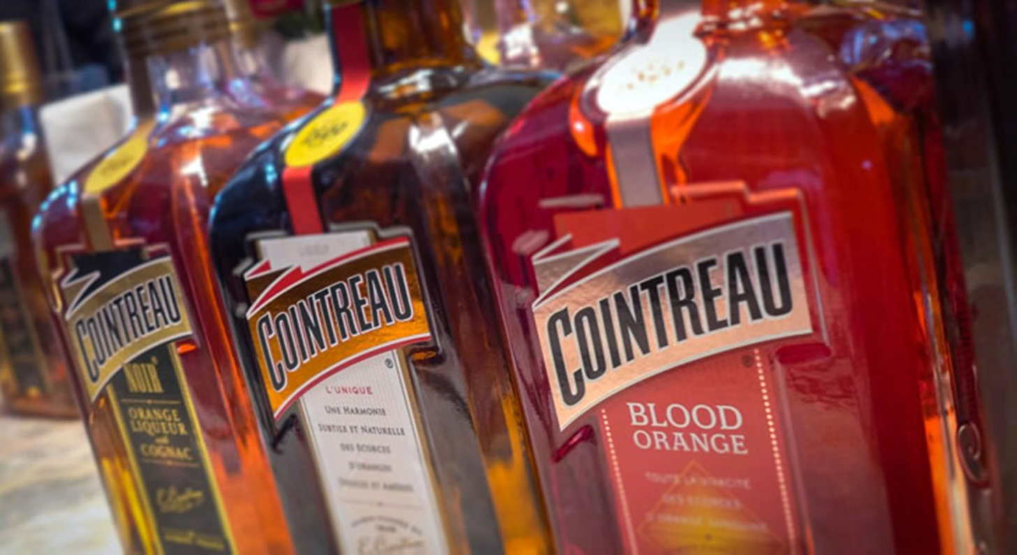Ликьор Cointreau: история, как се прави, видове + как да се пие